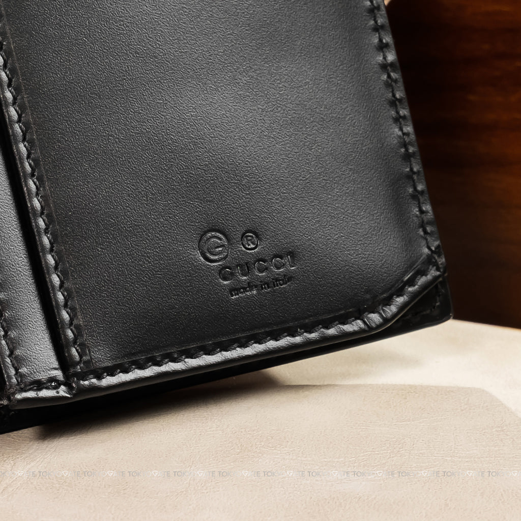 Ví nam Gucci 779828 CWC1N 1000 Signature Guccissima Leather